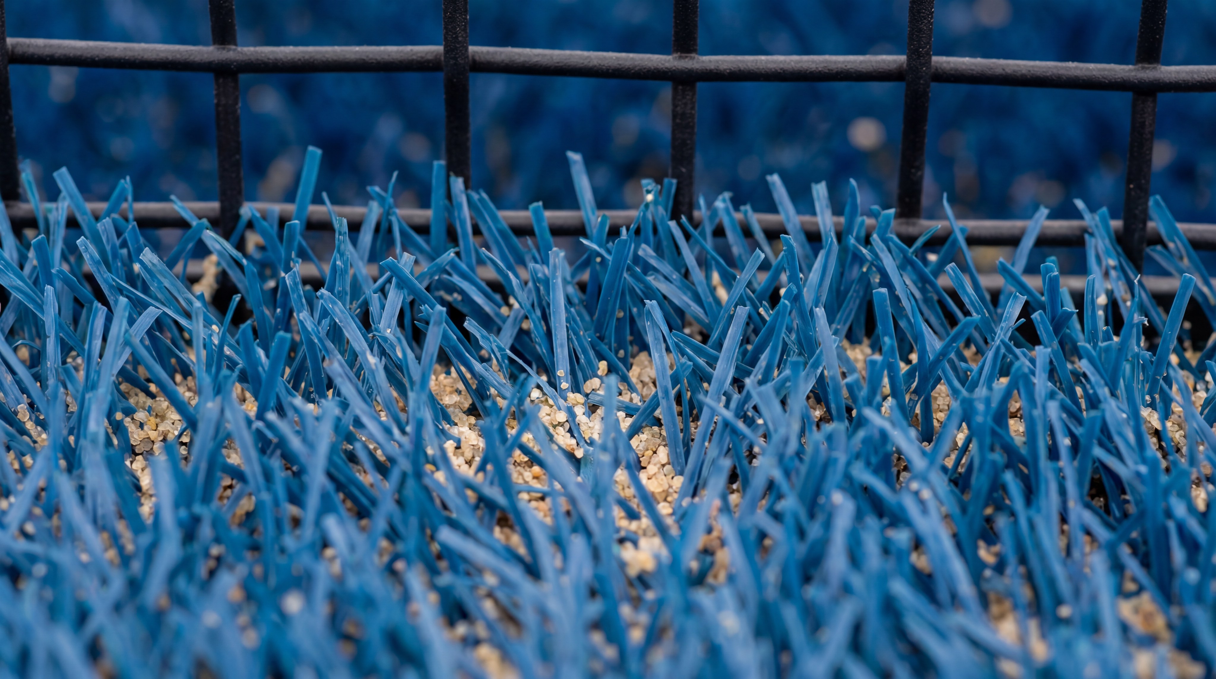 Close up of padel court turf and sand