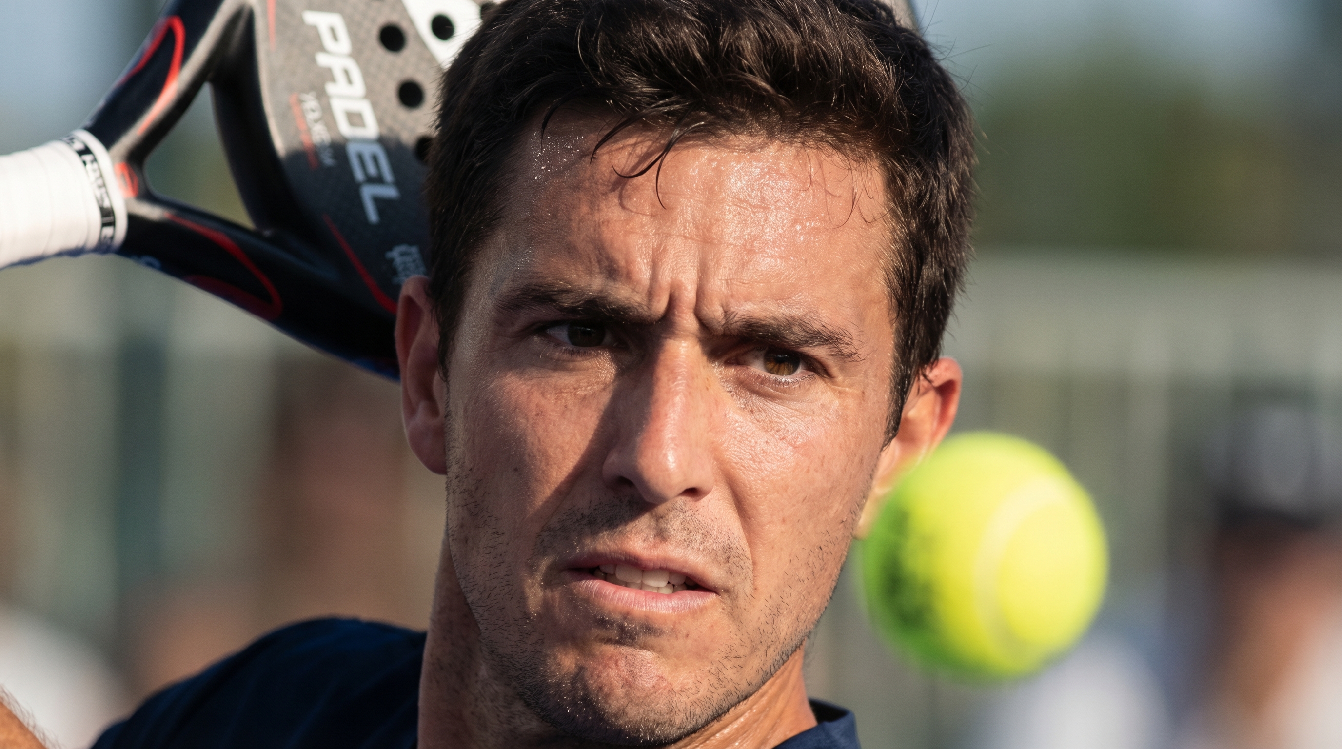 padel player intense volley closeup