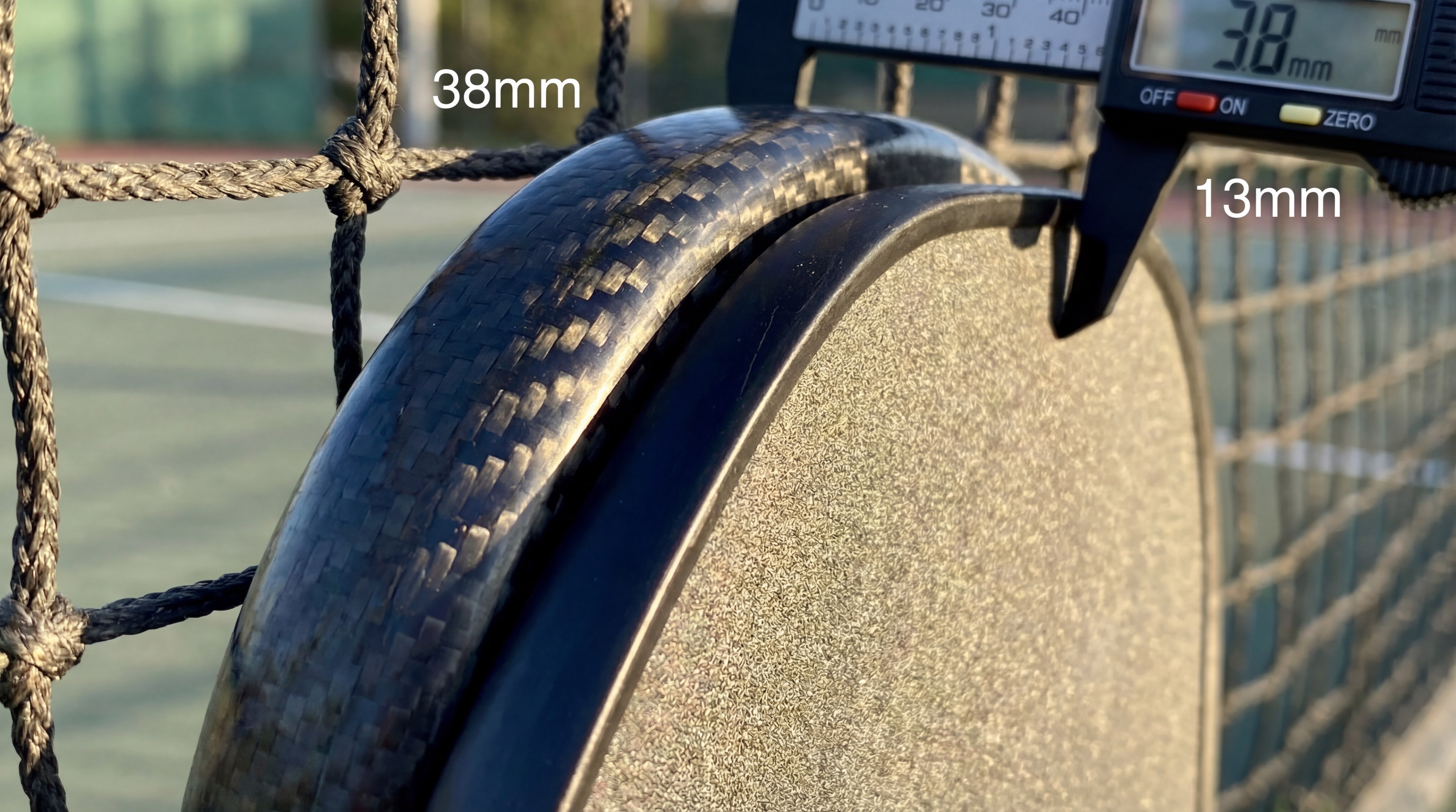 Close-up of padel racket and pickleball paddle comparison