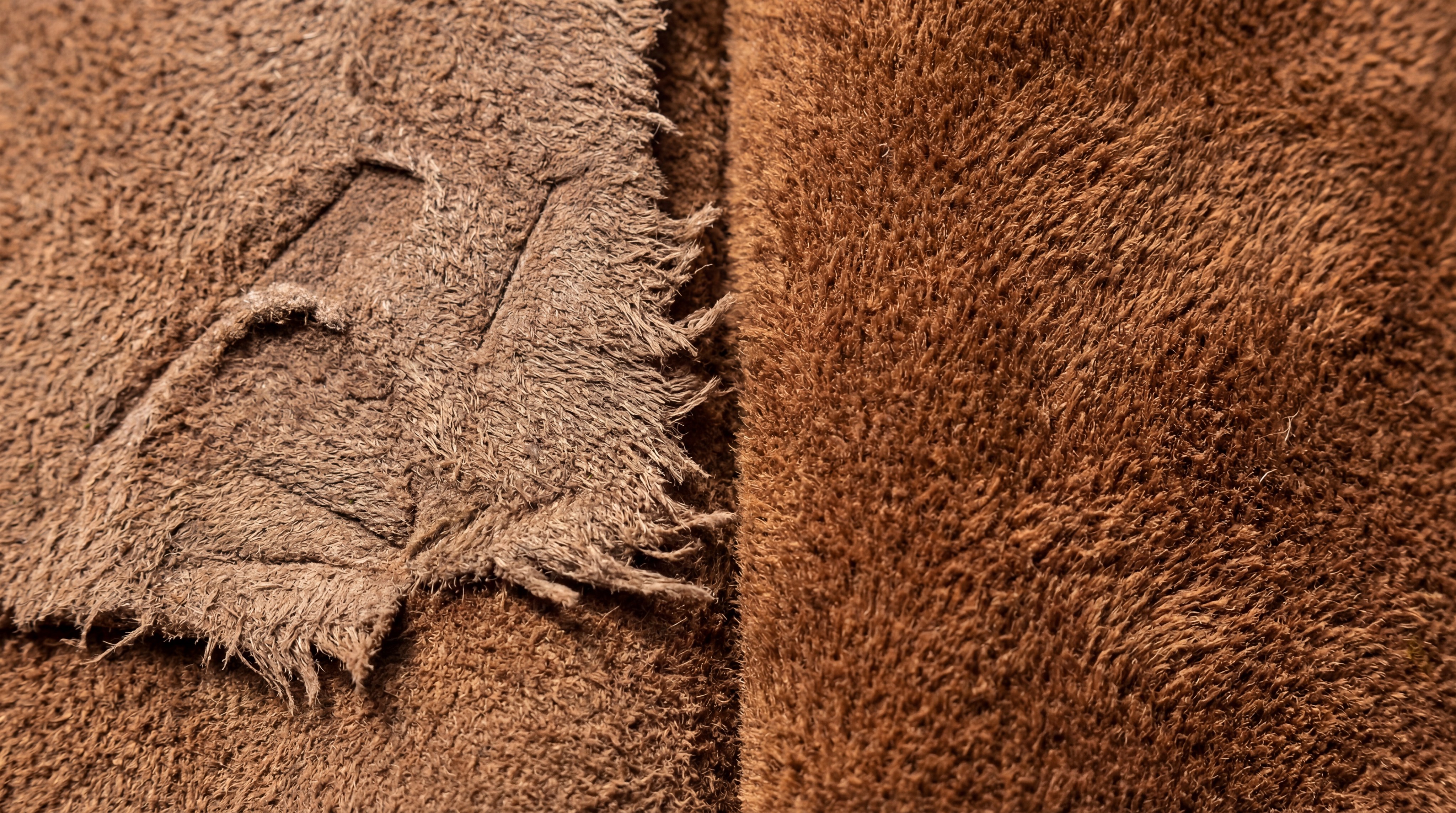 Macro shot of matted suede vs. restored fluffy nap