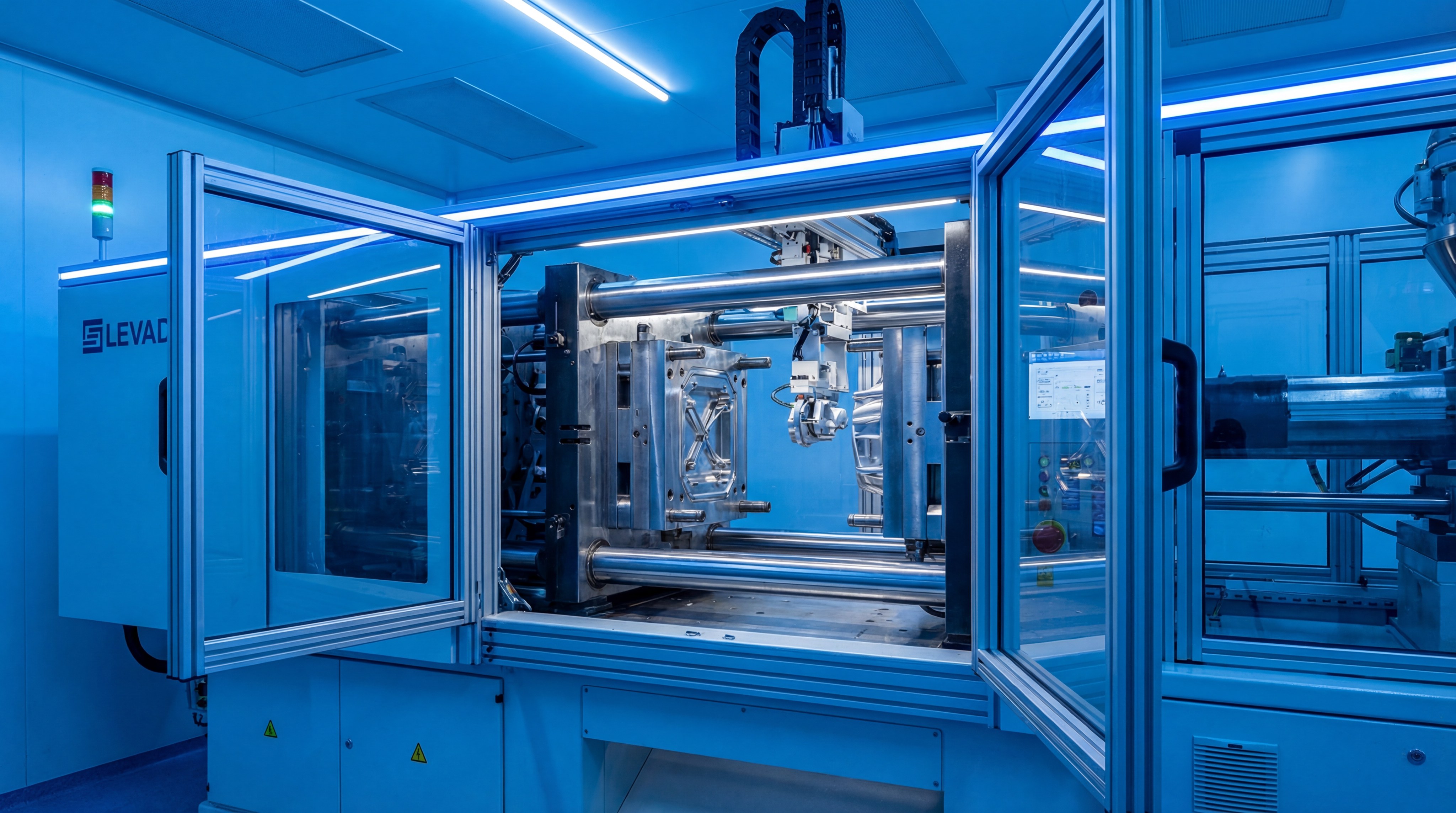 Industrial liquid silicone rubber (LSR) injection molding machine in a cleanroom.