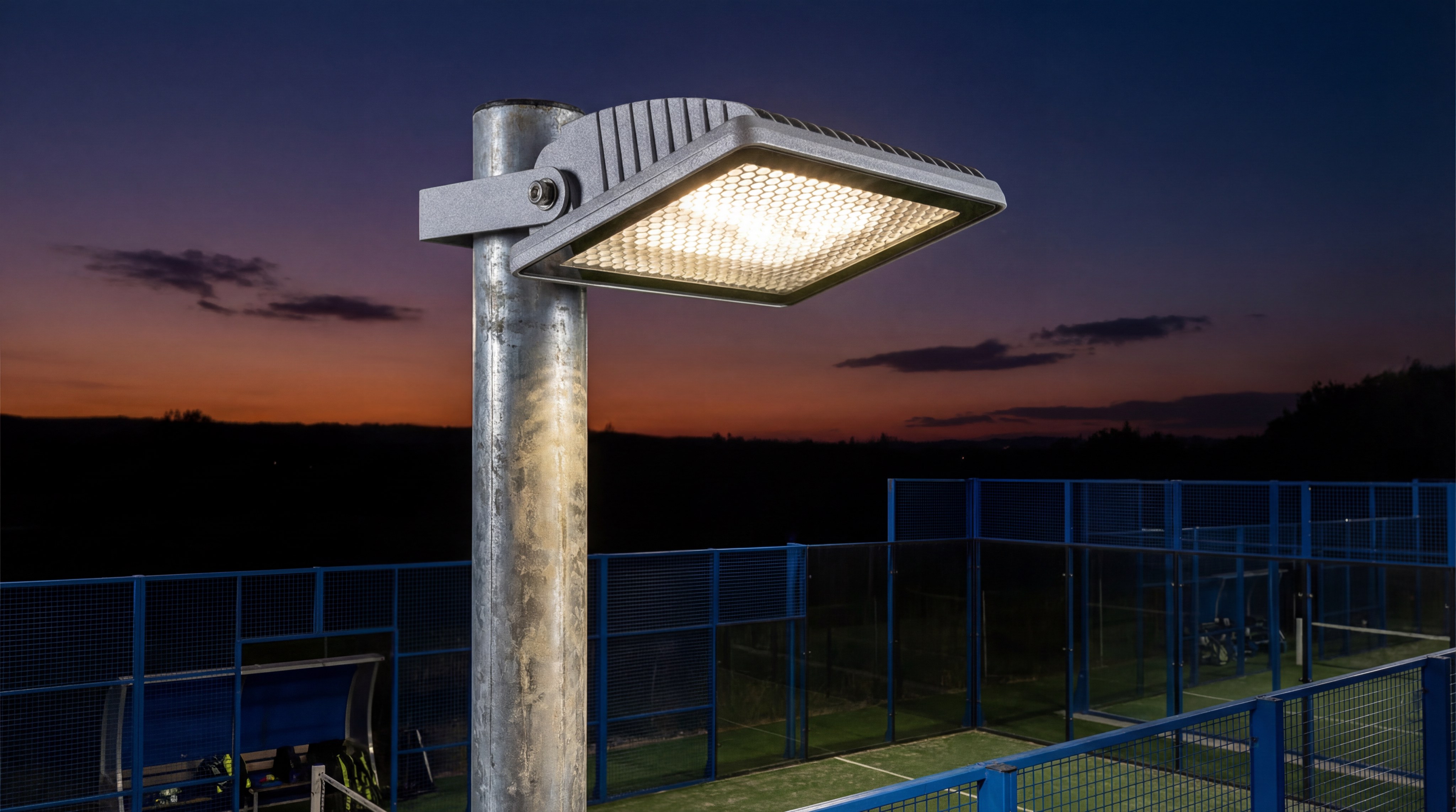 High-efficiency anti-glare LED floodlight fixture mounted on a court pole