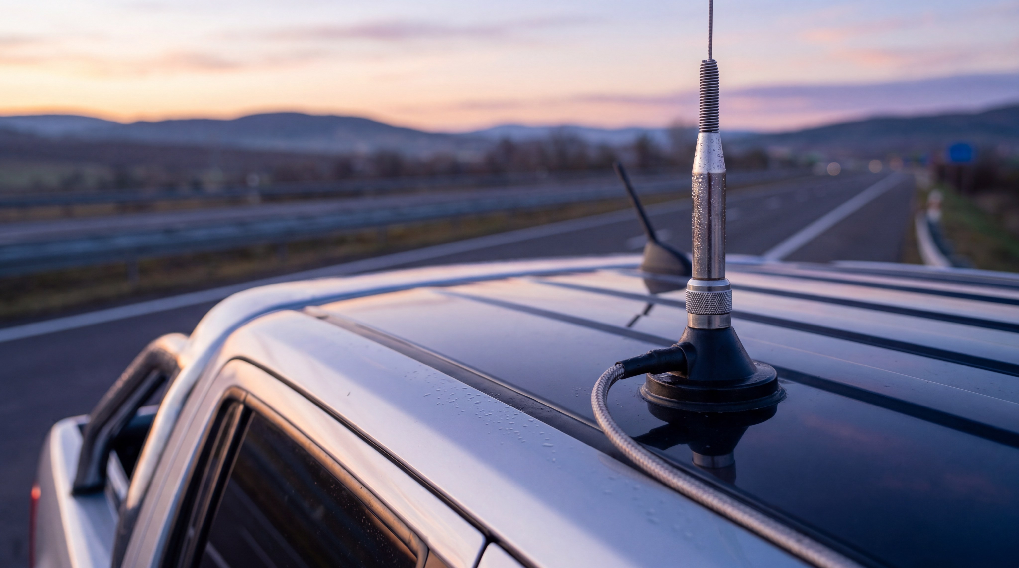 Professional mobile RF antenna setup with magnetic whip antenna on vehicle roof