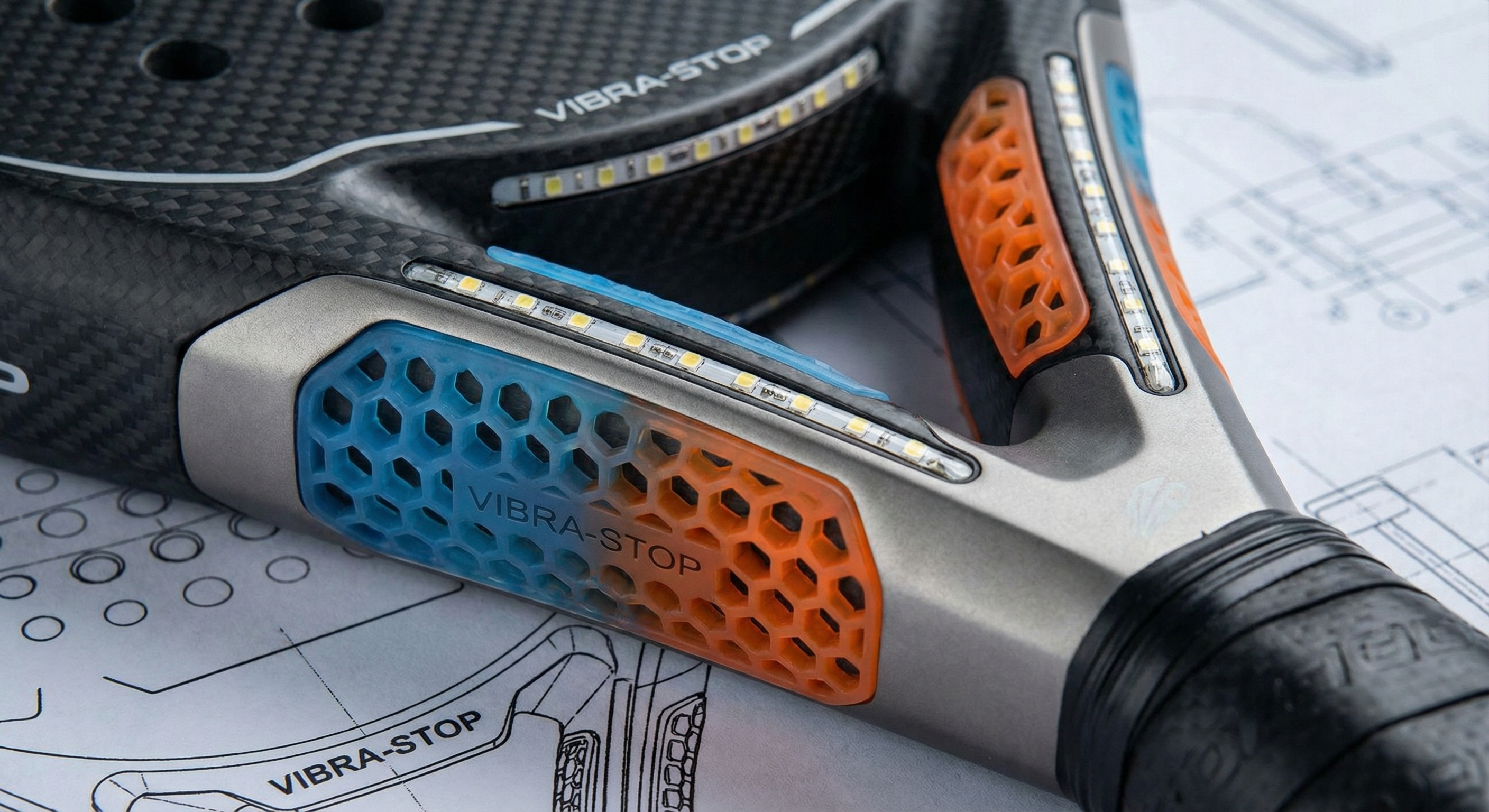 Close up of a racket handle with an anti-vibration grip applied