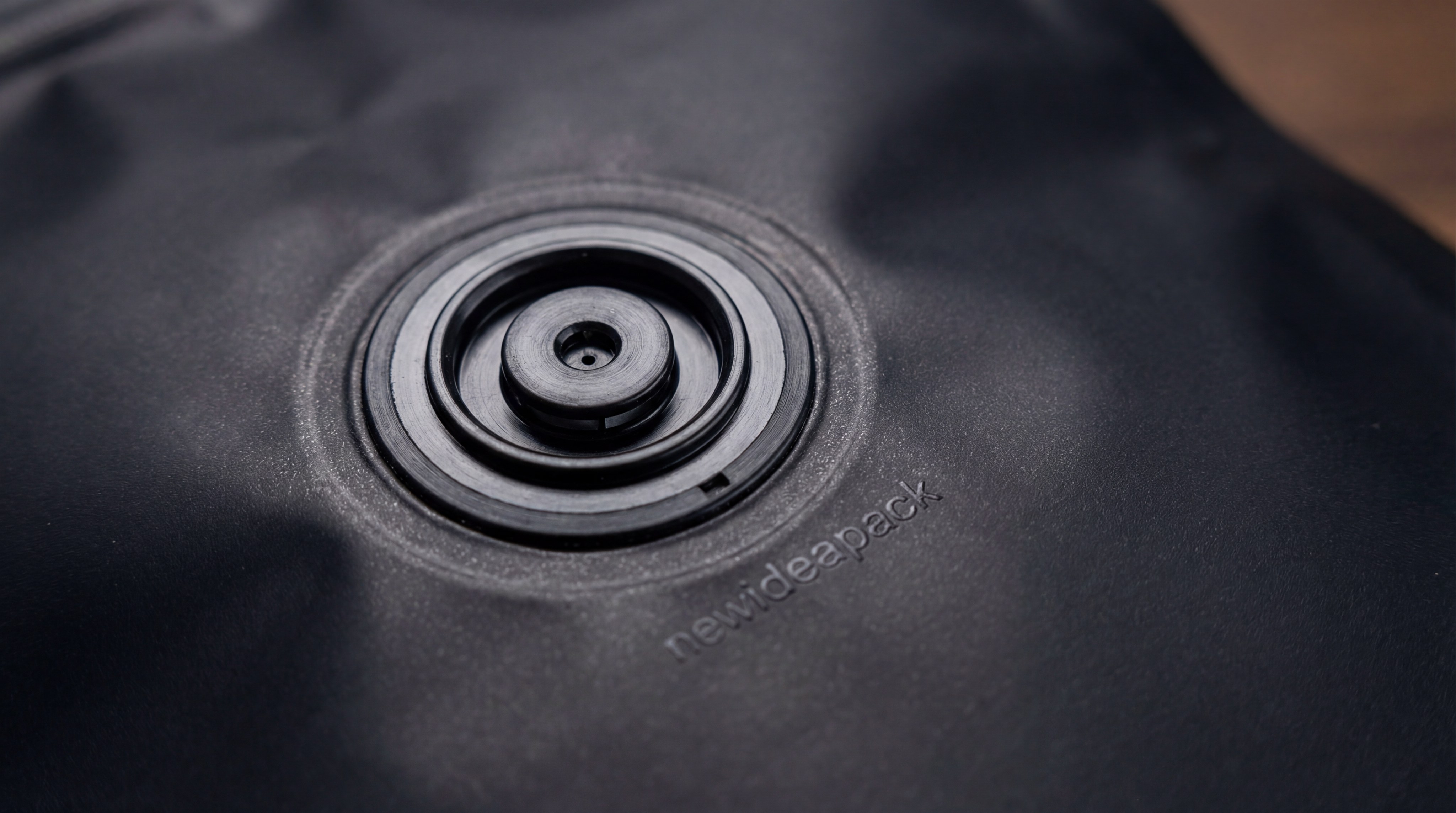 One-way degassing valve on coffee pouch to manage coffee degassing time and gas release.