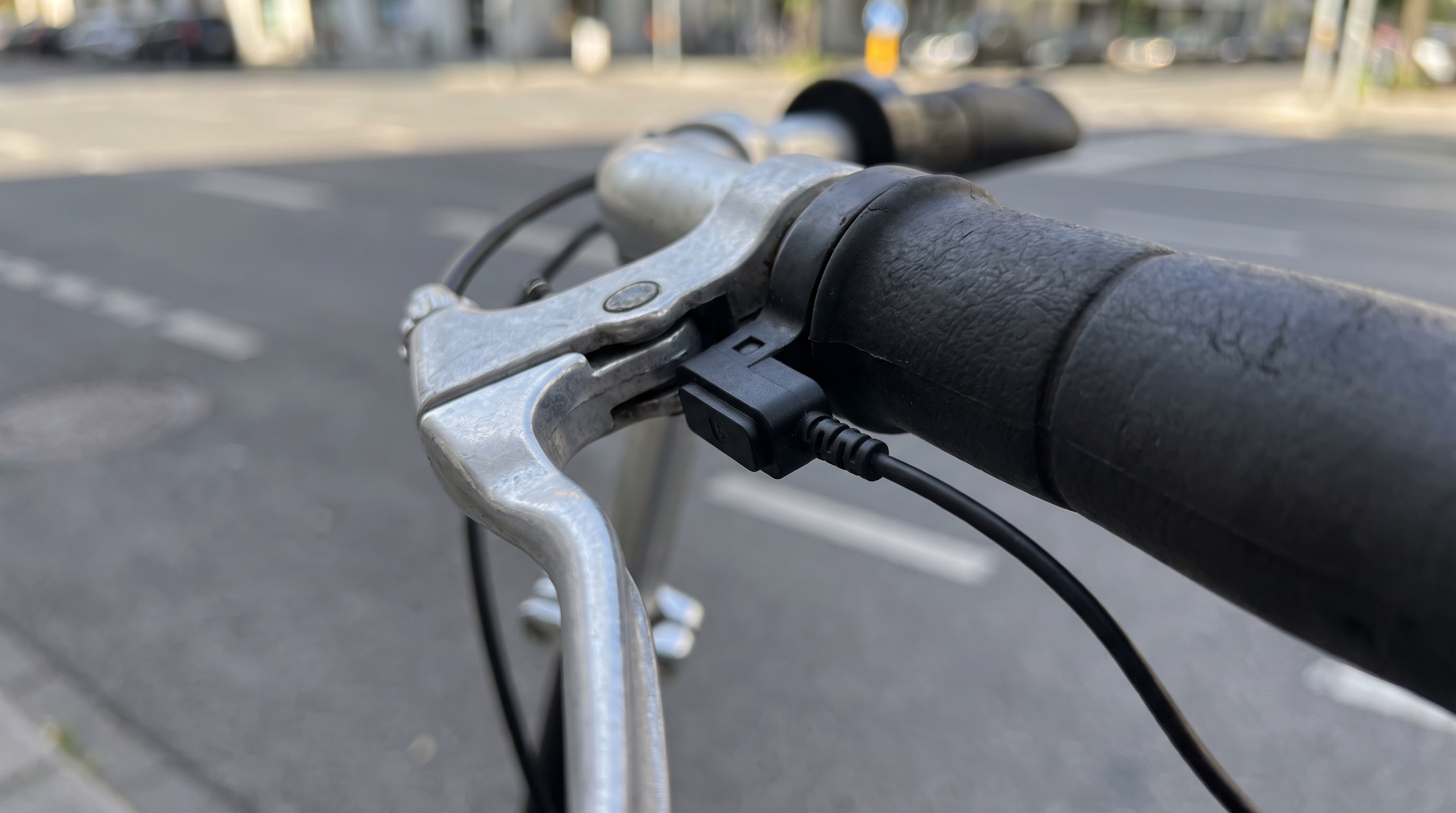 Electric Scooter Brake Lever and Handlebar Close-up