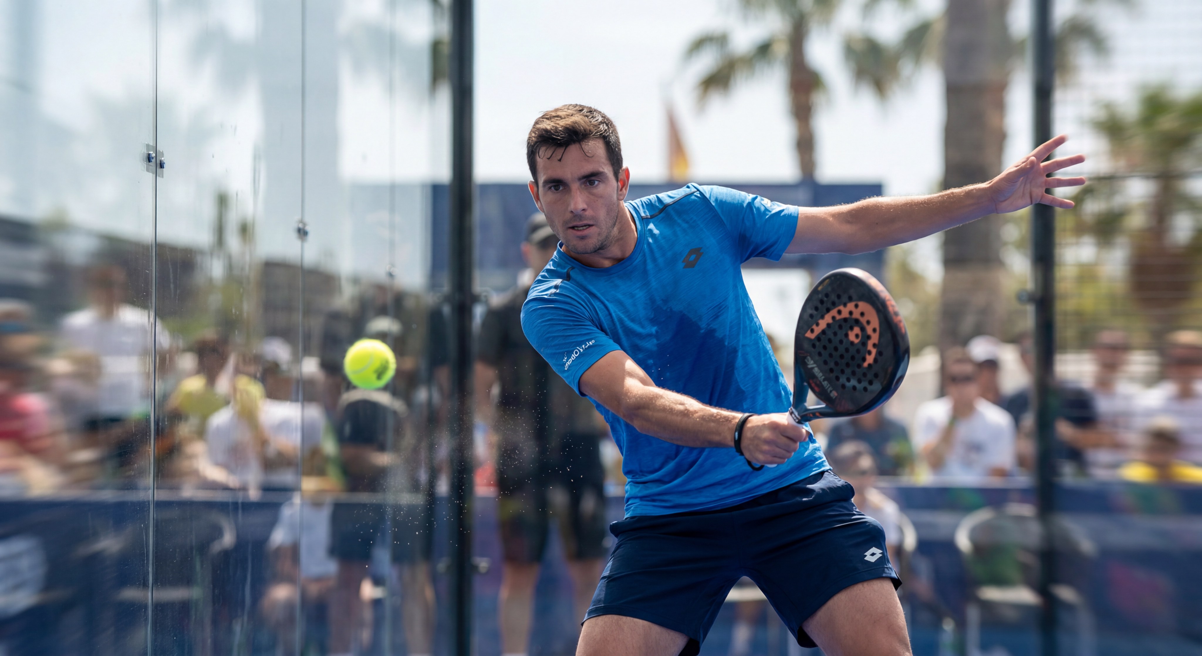 padel player glass wall shot