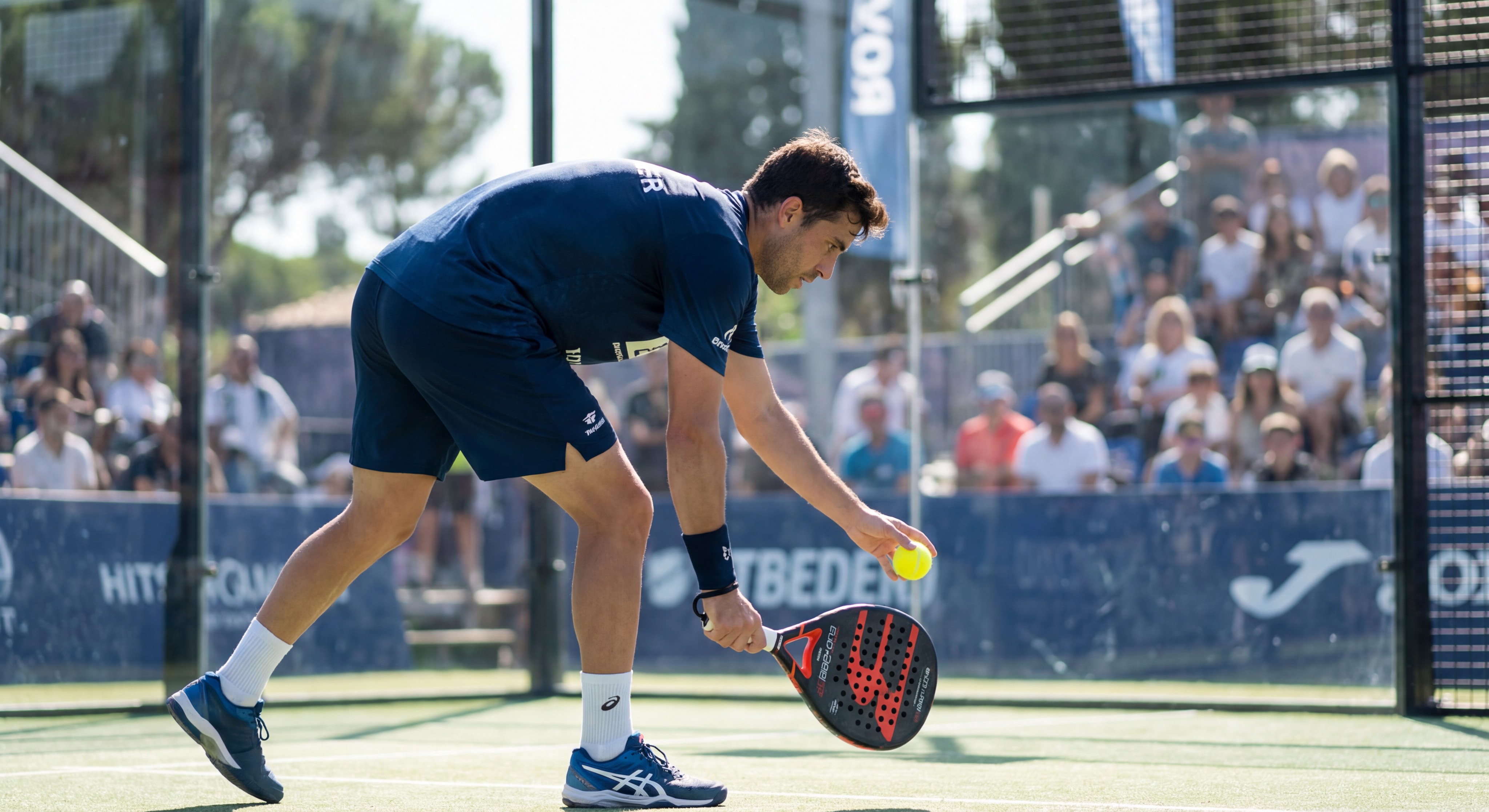 padel player underhand serve index 1.jpeg
