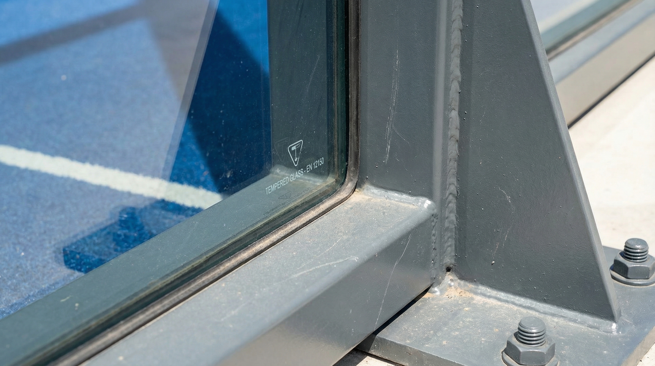 padel court glass structure closeup