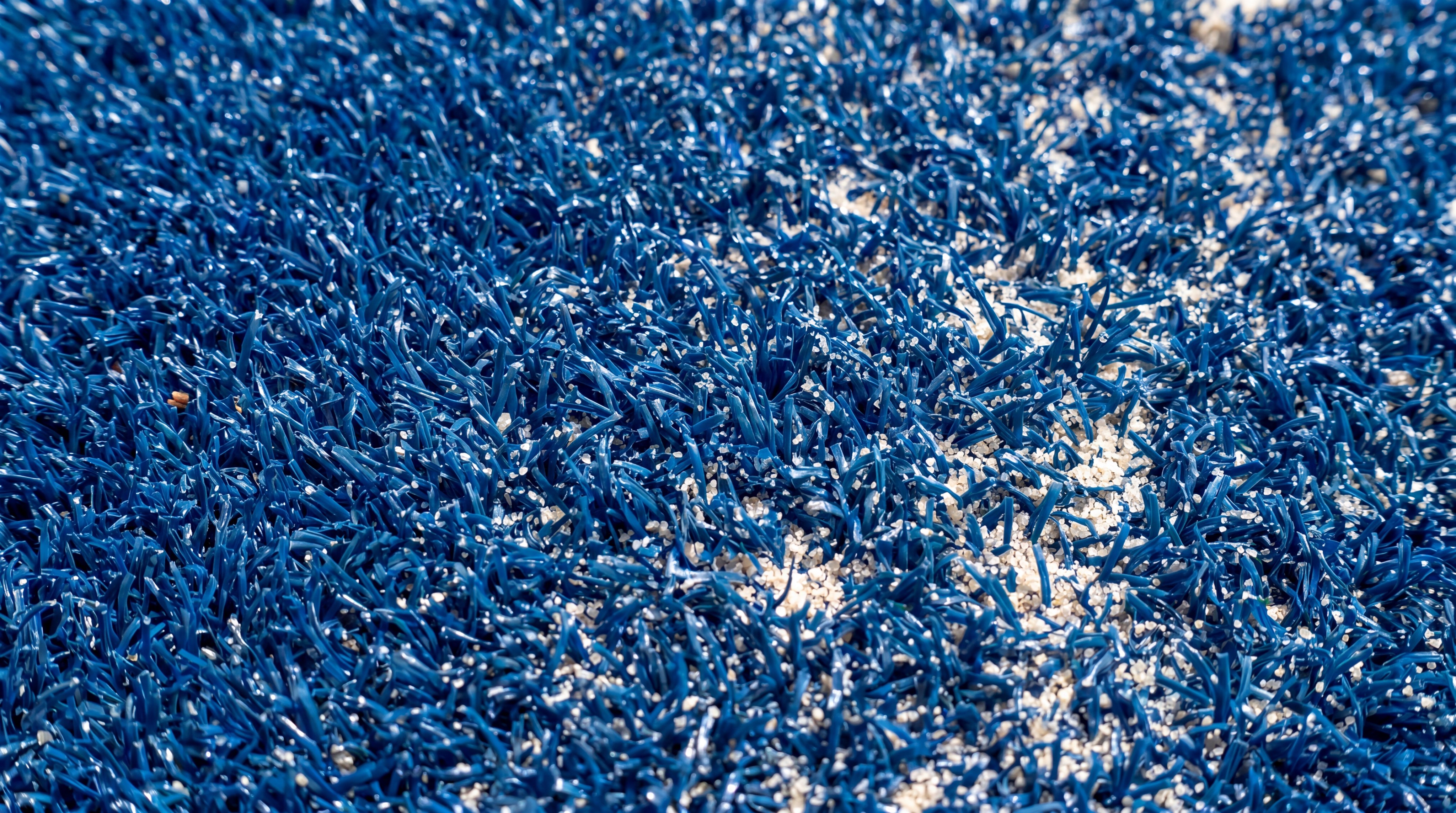 blue synthetic padel turf texture
