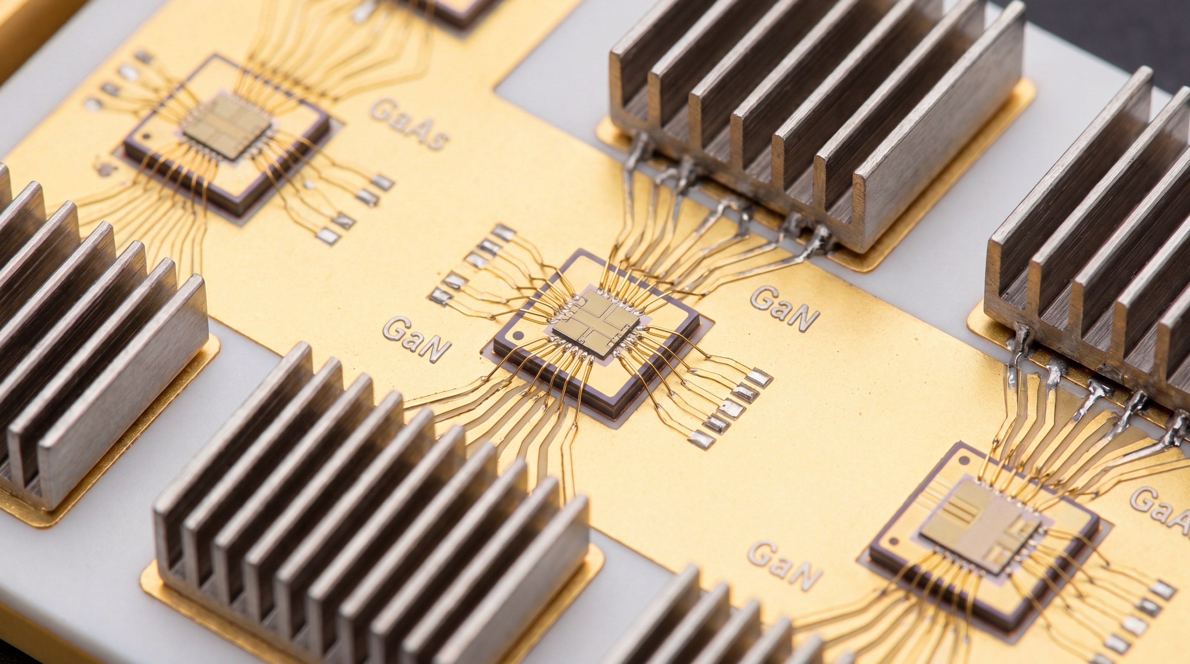 Semiconductor macro photography showing GaN and GaAs components