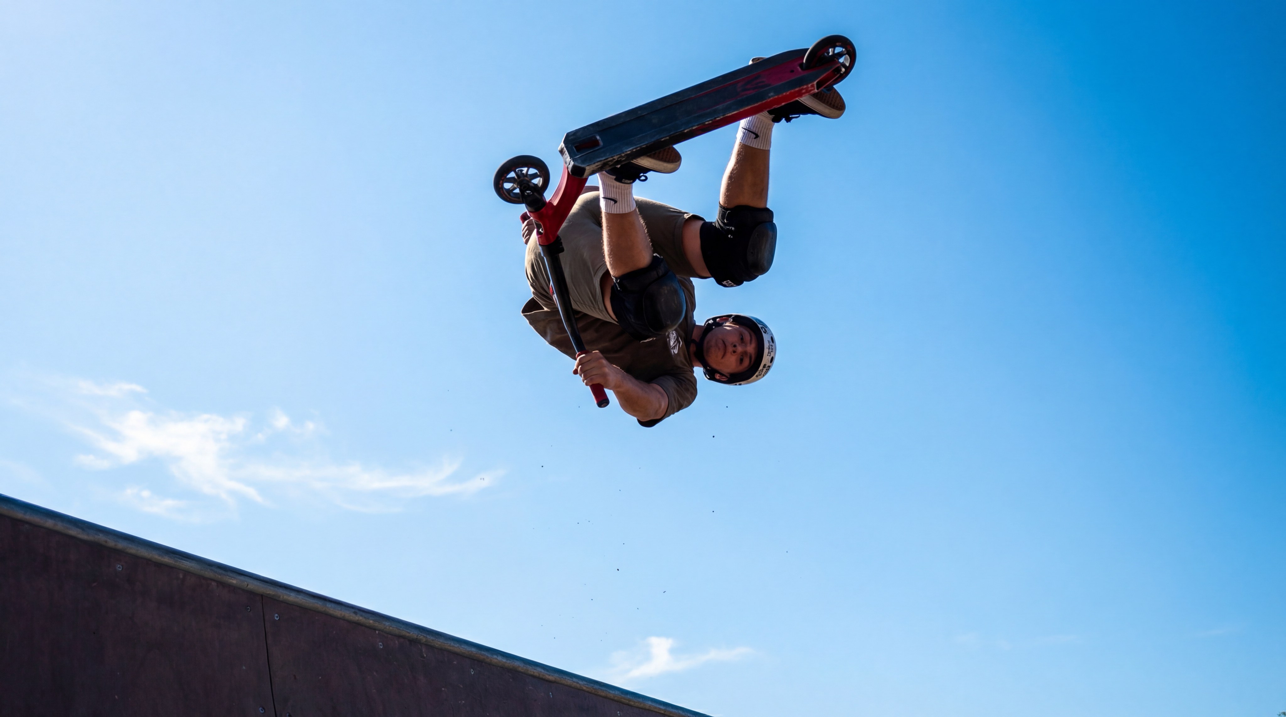 inward bri flip scooter trick