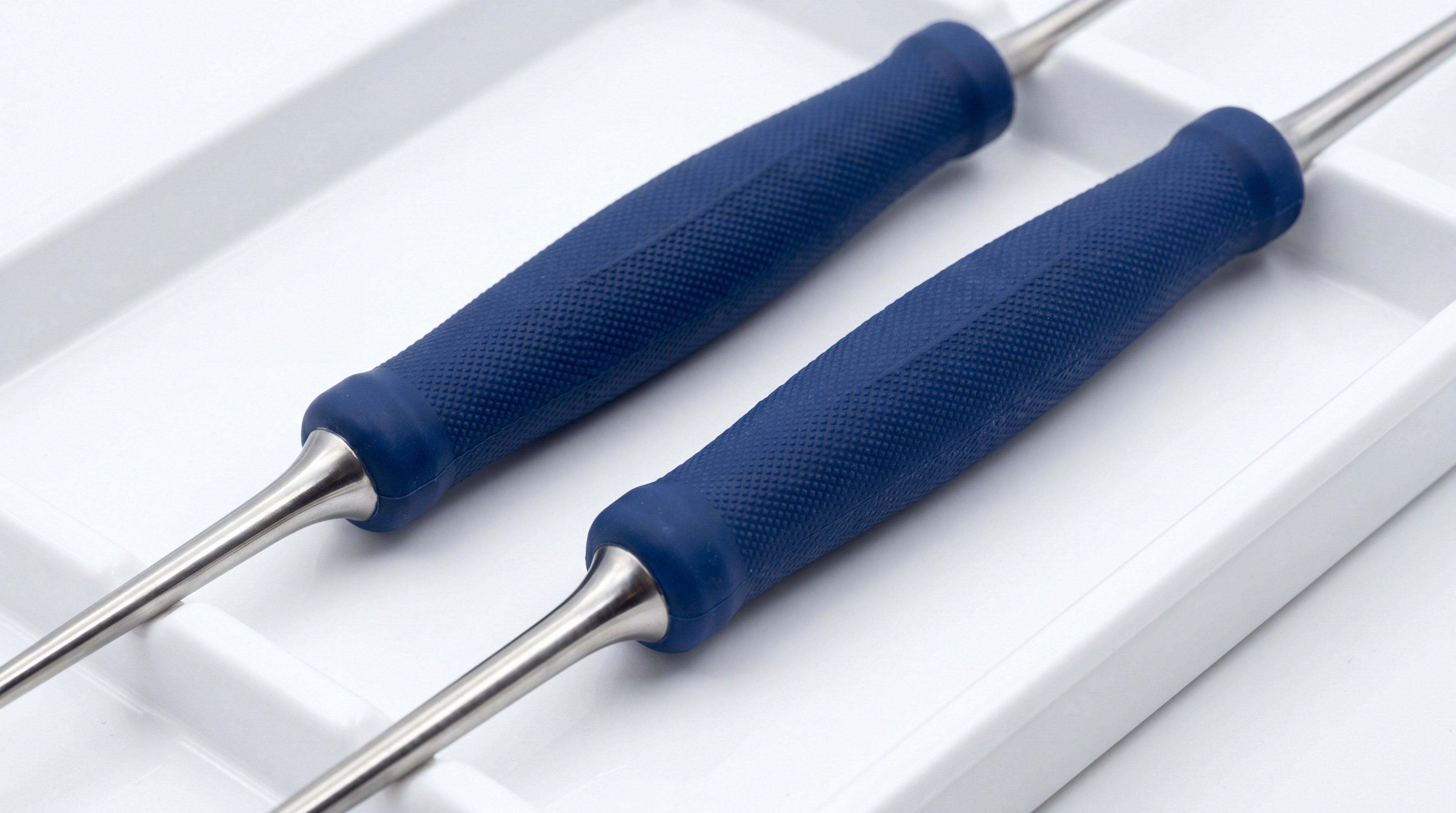 Overmolded medical surgical handles on a sterile white tray